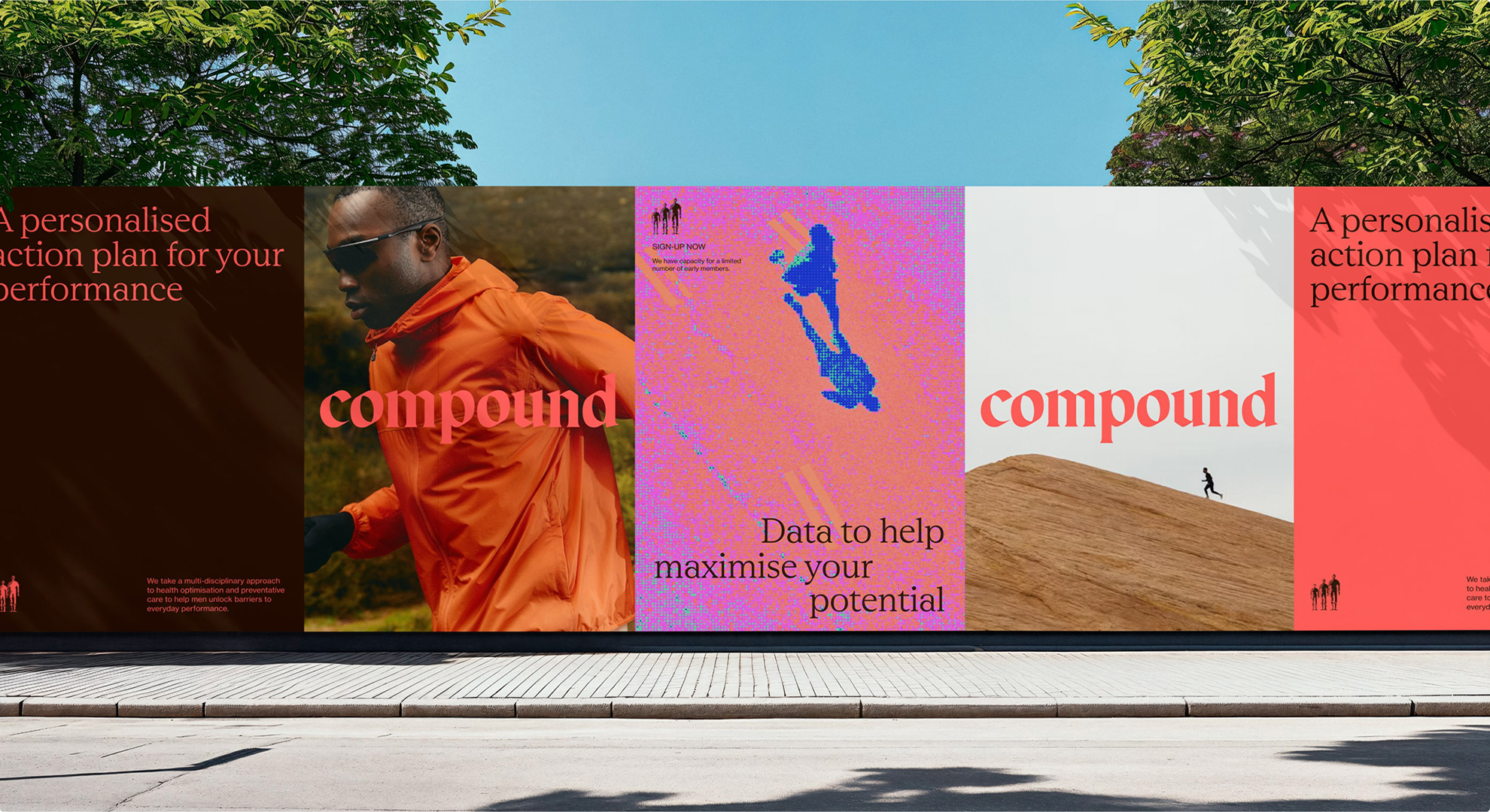 An outdoor advertisement features a series of posters. From left to right: a man running in an orange jacket, a slogan "A personalised action plan for your performance," a pixelated athletic figure with "Data to help maximise your potential," and a lone runner on a hill.