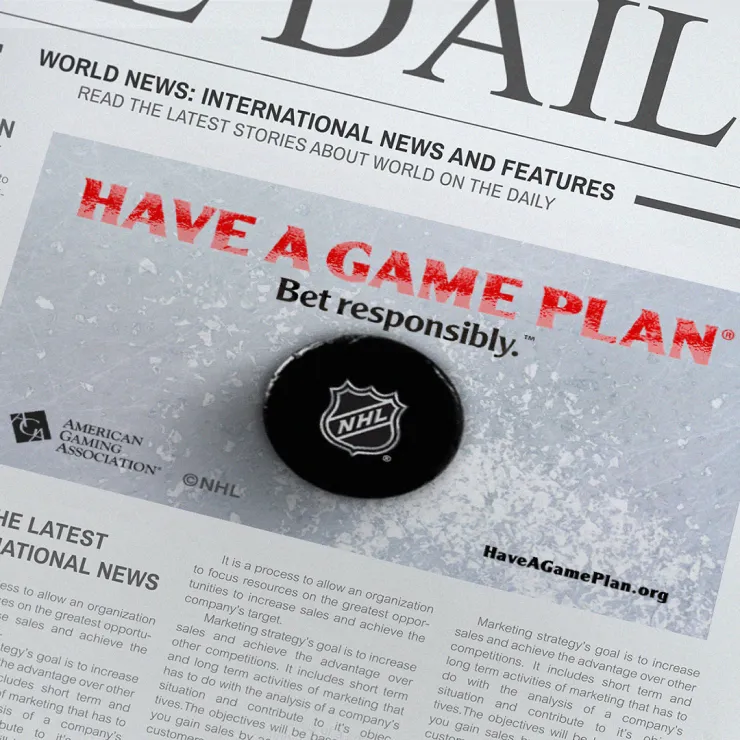 A flyer placed on a newspaper reads: "HAVE A GAME PLAN. Bet responsibly." It features the NHL logo and is sponsored by the American Gaming Association. The flyer includes a link to HaveAGamePlan.org and social media handle @NHL.