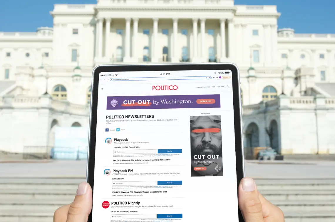 A person holds a tablet in front of the U.S. Capitol building. The tablet screen displays the Politico website, showing a list of newsletters including "Playbook," "Playbook PM," and "POLITICO Nightly." An advertisement banner reads "Cut Out by Washington," highlighting advocacy campaigns and policy communication.