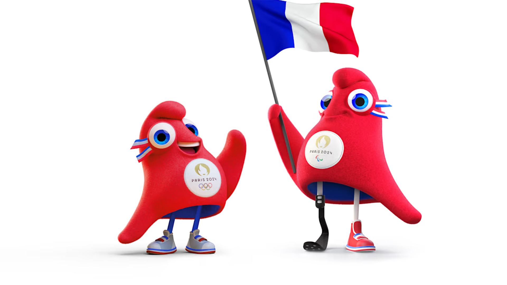 Two cheerful red mascots stand together on a white background. They have round eyes, waving arms, and are wearing sneakers. The larger mascot holds a French flag and a hockey stick. Both have the Paris 2024 Olympics logo on their chests.